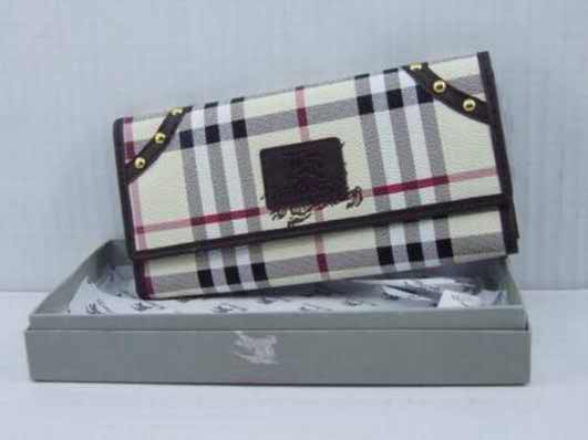 vente portefeuille,portefeuille chequier,cravate burberry,portefeuille autruche